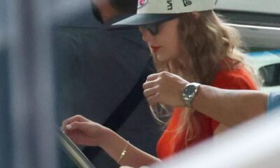 Taylor Swift Front with Kansas City Wears, Cap and TNT Bracelet in Melbourne In Nod to Travis kelce 