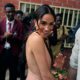 Meghan Markle Slammed and roasted over her choice of dress during the visit to nigeria...."Shameless, how could she put on a sleeveless and backless silk gown revealing her body like that"