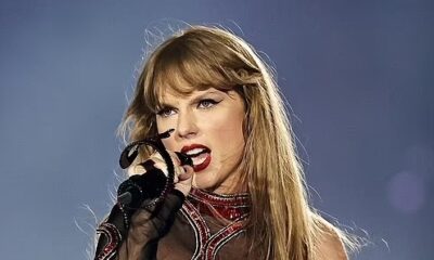 Ouch! Taylor Swift explains how she lost a 'chunk' from her hand while performing in Houston - after fans noticed nasty injury during Eras Tour