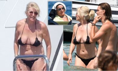 Penny Lancaster, 53, wows in a tiny black bikini as she soaks up the sun with husband Rod Stewart, 79, on £50million yacht in Sardinia