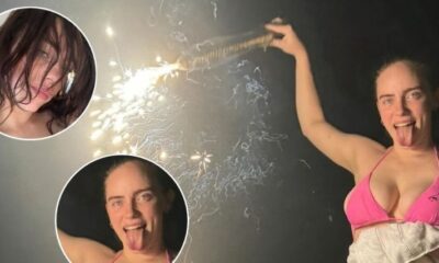 BREAKING NEWS! Weird singer acts weird for the camera! – Billie Eilish puts on a very BUSTY display in a RARE bikini snap and faces Serious BACKLASH as she lights off fireworks during a celebration: “Why do people take pictures with their tongue stuck out??? Why? It’s disgusting….”