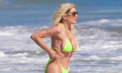 Tori Spelling proudly parades her bikini body at 51 after finally revealing the REAL reason for the 'gaping hole' between her boobs