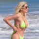 Tori Spelling proudly parades her bikini body at 51 after finally revealing the REAL reason for the 'gaping hole' between her boobs