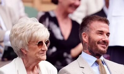 David Beckham is besieged by fans as he leads the Centre Court stars for day one of Wimbledon - before joining Katherine Jenkins and her husband Andrew Levitas in the Royal Box following OBE drama