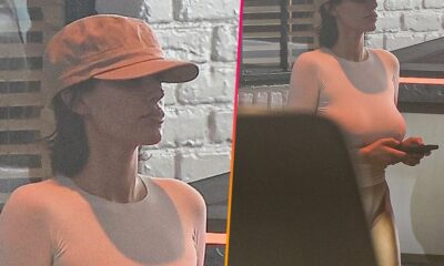 Bianca Censori covers up her breasts with a modest top (but no bottoms) as she and Kanye West go to lunch at the fancy Chateau Marmont in LA