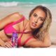 Brittany Mahomes stuns in rocking a hot pink cutout bikini after making her Sports Illustrated Swimsuit debut and Patrick couldn't keep his dreamy eyes off her as he ... See More