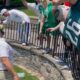 Jason Kelce chugs beers with fans at his charity golf tournament as the former NFL star continues to make the most of retirement